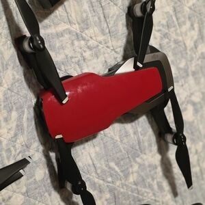 DJI Scarlet and Ebony Drone with Metallic Highlights